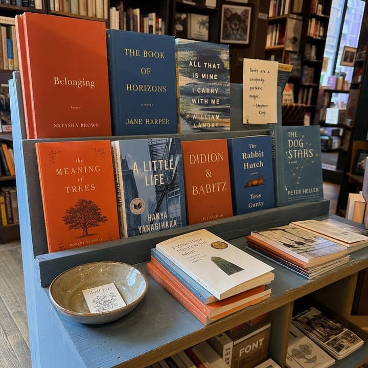 A bookstore table with colorful books
